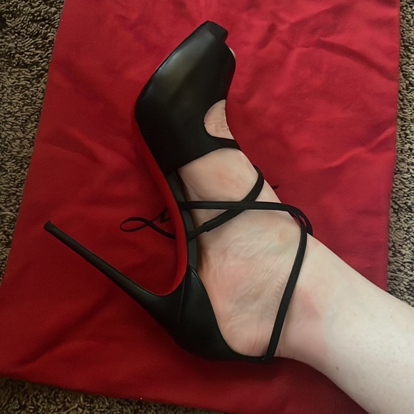 Christian Louboutin red bottom heels. - Picture 10 of 11